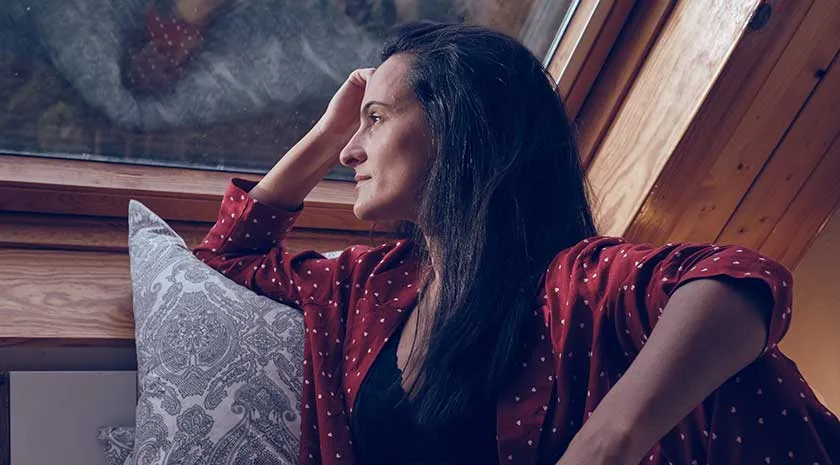 Women staring out the window - DHEA